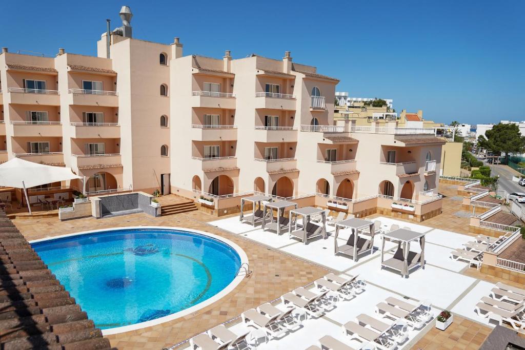 Delightful aparthotel with pool, SAN ANTONIO BAY – Property Code: SANTAZHT